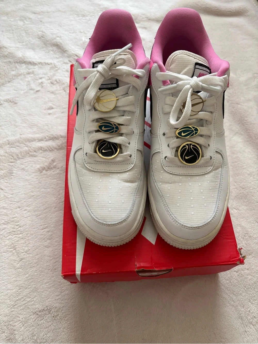 Nike White Sneakers with Pink Lining and Gold Accent Lace Charms